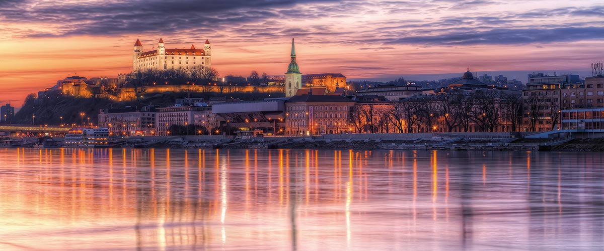 A view towards Bratislava across the river at sunset, Slovakia
